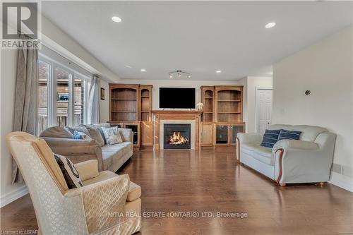 1833 Devos Drive, London, ON - Indoor Photo Showing Living Room With Fireplace