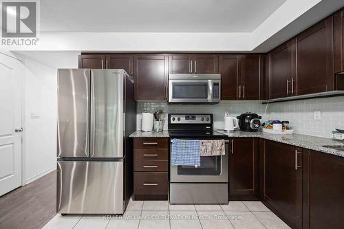 620 - 140 Widdicombe Hill Boulevard, Toronto, ON - Indoor Photo Showing Kitchen With Stainless Steel Kitchen