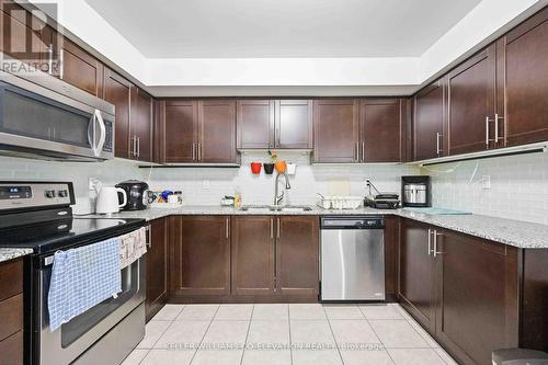 620 - 140 Widdicombe Hill Boulevard, Toronto, ON - Indoor Photo Showing Kitchen With Stainless Steel Kitchen With Double Sink