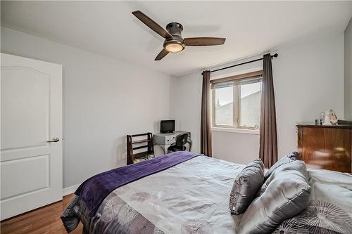 Hardwood floors, window coverings and fan included - 5255 Dryden Avenue, Burlington, ON - Indoor Photo Showing Bedroom