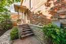Private stamped concrete walkway to front door and to backyard gate. - 5255 Dryden Avenue, Burlington, ON  - Outdoor 