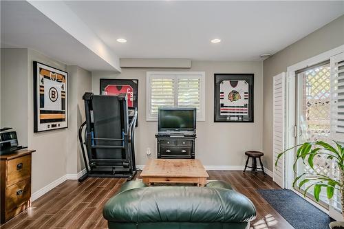 California Shutters, heated floors, afternoon sun, walk out to deck and stamped concrete, 2 gazebo's, hot tub and sitting area. Man cave or Family room... either way...Bliss - 5255 Dryden Avenue, Burlington, ON - Indoor