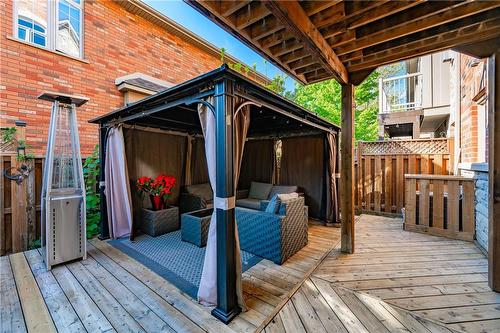 Relax under the canopy in your private backyard. - 5255 Dryden Avenue, Burlington, ON - Outdoor With Deck Patio Veranda With Exterior