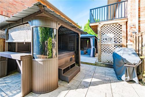 Outdoor entertaining is a breeze in your hot tub, with private gazebo with bar. - 5255 Dryden Avenue, Burlington, ON - Outdoor With Exterior