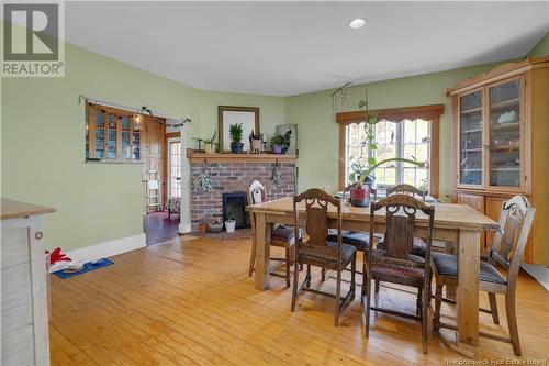 40 Gregory Lane, Saint John, NB - Indoor Photo Showing Dining Room With Fireplace
