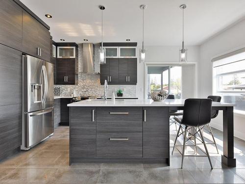 Cuisine - 3890 Rue La Fredière, Longueuil (Saint-Hubert), QC - Indoor Photo Showing Kitchen With Upgraded Kitchen