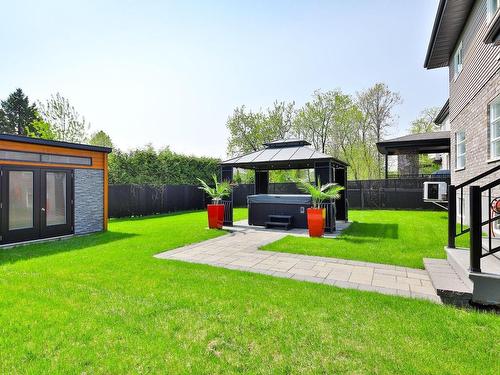 Cour - 3890 Rue La Fredière, Longueuil (Saint-Hubert), QC - Outdoor With Backyard With Exterior