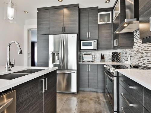 Cuisine - 3890 Rue La Fredière, Longueuil (Saint-Hubert), QC - Indoor Photo Showing Kitchen With Double Sink With Upgraded Kitchen