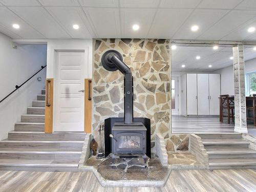 Vue d'ensemble - 207 Ch. De La Baie-De-La-Paix, Val-D'Or, QC - Indoor Photo Showing Other Room With Fireplace