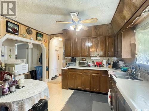 902 109Th Street, North Battleford, SK - Indoor Photo Showing Kitchen With Double Sink