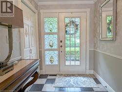 Gorgeous foyer with leaded glass windows - 