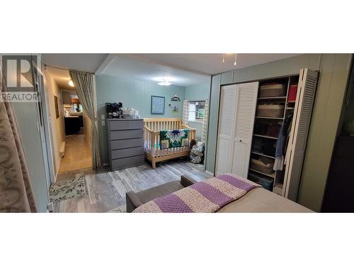 8749 6 Highway, Silverton, BC - Indoor Photo Showing Bedroom