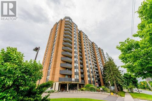 1407 - 3845 Lake Shore Boulevard W, Toronto (Long Branch), ON - Outdoor With Balcony With Facade