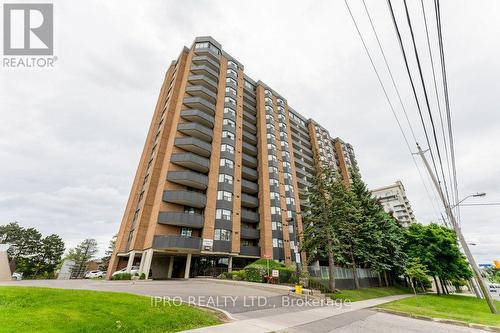 1407 - 3845 Lake Shore Boulevard W, Toronto (Long Branch), ON - Outdoor With Balcony With Facade