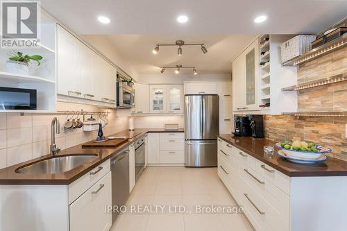 1407 - 3845 Lake Shore Boulevard W, Toronto (Long Branch), ON - Indoor Photo Showing Kitchen