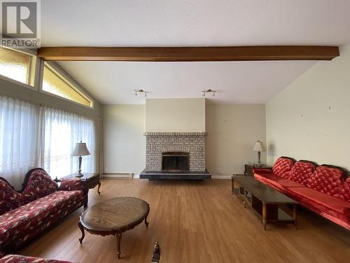 318-320 Alberta Place, Prince Rupert, BC - Indoor Photo Showing Living Room With Fireplace