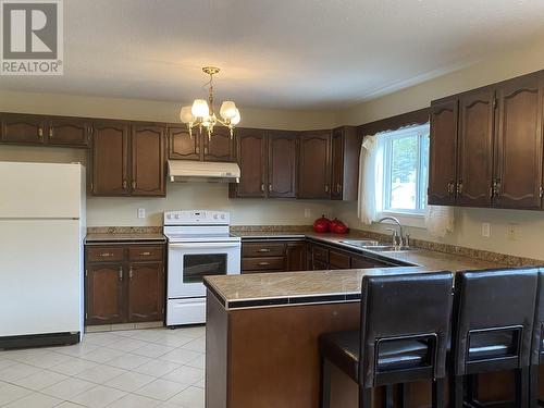 318-320 Alberta Place, Prince Rupert, BC - Indoor Photo Showing Kitchen With Double Sink