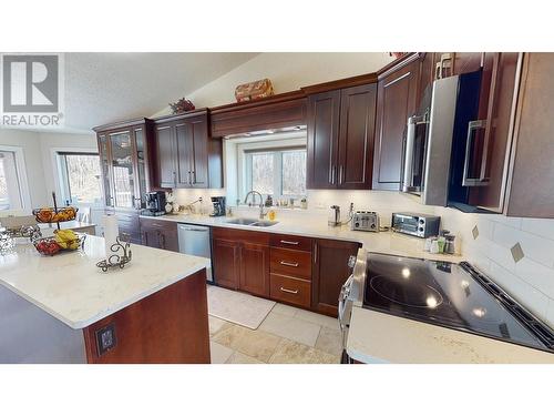 11822 244 Road, Fort St. John, BC - Indoor Photo Showing Kitchen With Double Sink