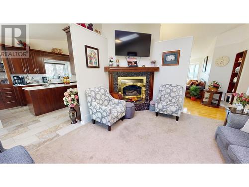 11822 244 Road, Fort St. John, BC - Indoor Photo Showing Living Room With Fireplace