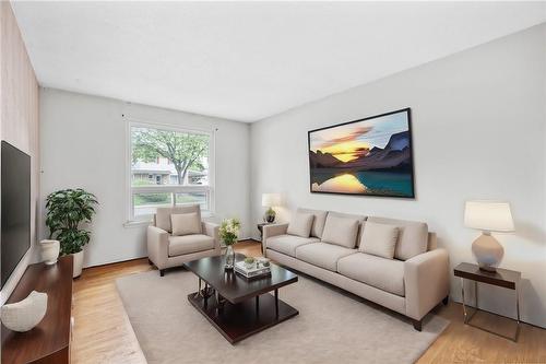 Virtually Staged - 207 Birchcliffe Crescent, Hamilton, ON - Indoor Photo Showing Living Room