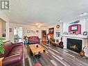 190 Redden Road, Quesnel, BC  - Indoor Photo Showing Living Room With Fireplace 