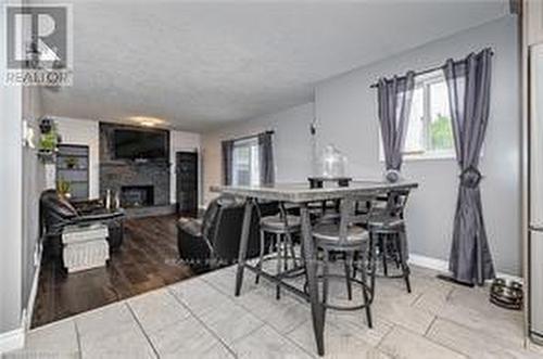 201 Bismark Drive, Cambridge, ON - Indoor Photo Showing Dining Room With Fireplace