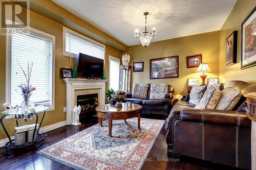 14 Masters Green Crescent, Brampton (Snelgrove), ON - Indoor Photo Showing Living Room With Fireplace