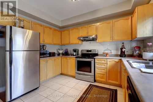 14 Masters Green Crescent, Brampton (Snelgrove), ON - Indoor Photo Showing Kitchen With Double Sink