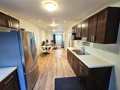 1468 Erin Street, Winnipeg, MB - Indoor Photo Showing Kitchen With Double Sink