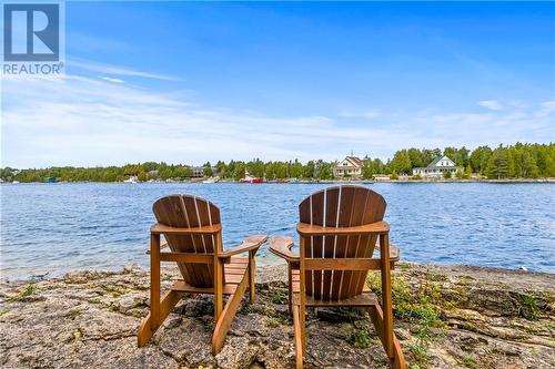 HIGHLIGHT: Stunning 132ft. of waterfront in protected, deep channel. - 70 Big Tub Road, Tobermory, ON - Outdoor With Body Of Water With View