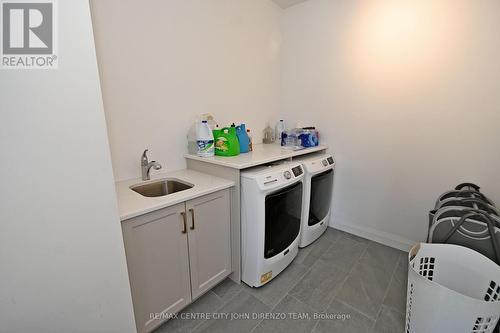 105 Aspen Circle, Thames Centre (Thorndale), ON - Indoor Photo Showing Laundry Room