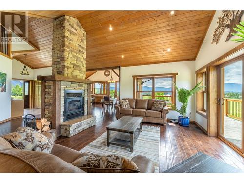 4720 36Th Street, Canyon, BC - Indoor Photo Showing Living Room With Fireplace