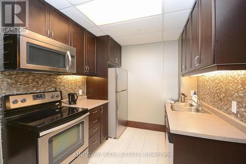 217 - 349 Rathburn Road W, Mississauga (City Centre), ON - Indoor Photo Showing Kitchen With Double Sink