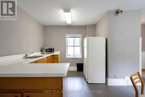 322 La Rose Avenue, Toronto (Willowridge-Martingrove-Richview), ON - Indoor Photo Showing Kitchen With Double Sink