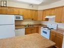 9307 62Nd Avenue Unit# 214, Osoyoos, BC  - Indoor Photo Showing Kitchen With Double Sink 