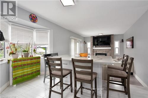 39 Golfdale Crescent, London, ON - Indoor Photo Showing Dining Room With Fireplace