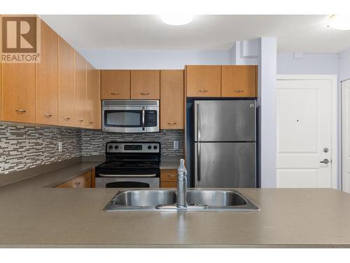 533 Yates Road Unit# 301, Kelowna, BC - Indoor Photo Showing Kitchen With Double Sink