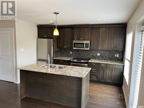 502 Geary Crescent, Saskatoon, SK - Indoor Photo Showing Kitchen With Stainless Steel Kitchen With Upgraded Kitchen