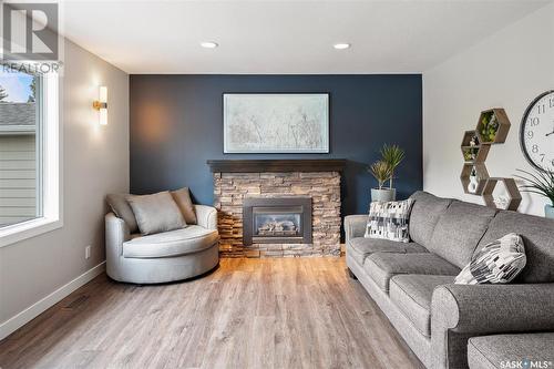 143 Trotchie Crescent, Saskatoon, SK - Indoor Photo Showing Living Room With Fireplace
