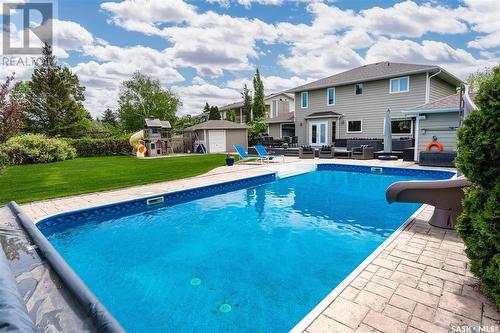 143 Trotchie Crescent, Saskatoon, SK - Outdoor With In Ground Pool With Deck Patio Veranda With Backyard