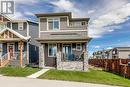 Inviting front porch - 617 Chinook Gate Greenway Sw, Airdrie, AB  - Outdoor With Deck Patio Veranda With Facade 