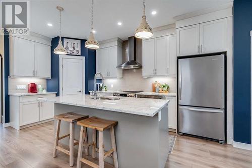 617 Chinook Gate Greenway Sw, Airdrie, AB - Indoor Photo Showing Kitchen With Upgraded Kitchen