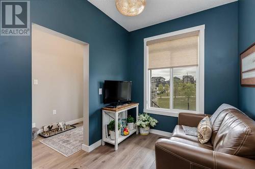 bonus room - 617 Chinook Gate Greenway Sw, Airdrie, AB - Indoor Photo Showing Living Room