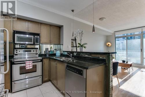 209 - 5 Marine Parade Drive, Toronto, ON - Indoor Photo Showing Kitchen With Double Sink