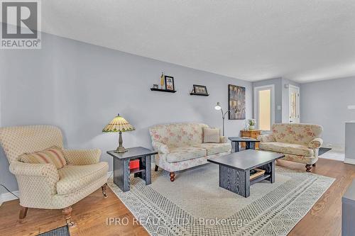 48 Upton Crescent, Guelph, ON - Indoor Photo Showing Living Room With Fireplace