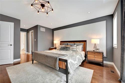 large master w/walk in closet & hdwd floor - 920 Stone Church Road E, Hamilton, ON - Indoor Photo Showing Bedroom