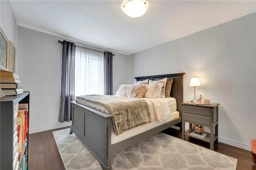 large 2nd bdrm w/hardwood - 920 Stone Church Road E, Hamilton, ON - Indoor Photo Showing Bedroom