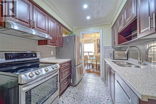 84 Simmons Boulevard, Brampton, ON - Indoor Photo Showing Kitchen With Double Sink