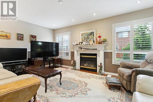 30 Benmore Crescent, Brampton, ON - Indoor Photo Showing Living Room With Fireplace