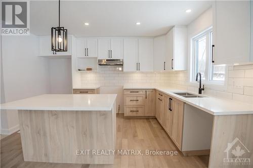 1409 Caroline Court, Cornwall, ON - Indoor Photo Showing Kitchen With Double Sink With Upgraded Kitchen